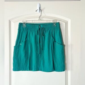 Love 21 green mini skirt with pockets and thick elastic waist medium